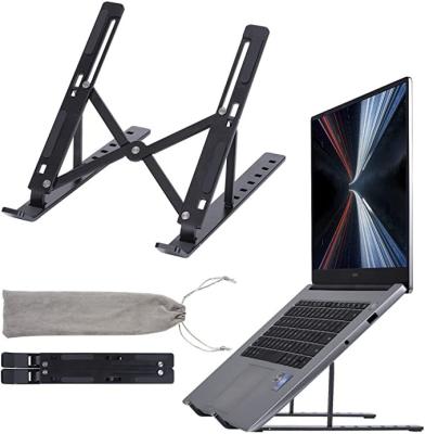 China Adjustable (height) Wholesale foldable Mini laptop stand metal adjustable notebook laptop desk stand foldable aluminum laptop stand for sale