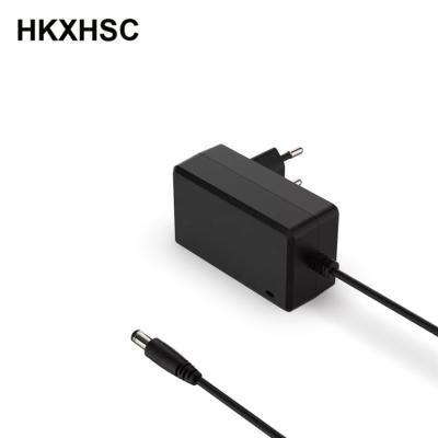 China Mobile phone wall plug in 16.8v 2a 2000ma dc to ac power supply change adapter for drone battery charge for sale