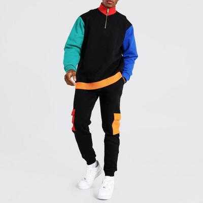 China Breathable Colors Combined Tracksuits For Men Stylish Zipper Up Trotter Sweatsuit Neck Support Collar Cargo Pockets for sale