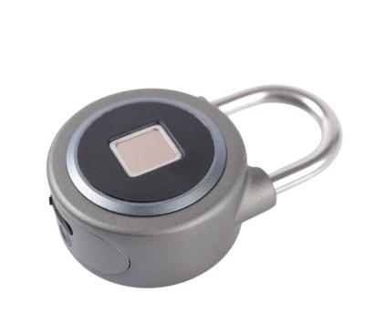 China Aluminum Alloy Circular fingerprint padlock mobile APP applet to unlock BT smart electronic lock USB charging for luggage,door,locker for sale