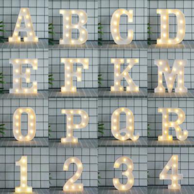 China Customized DIY 3D Letter Flashing Light Led Wedding Holiday Party Decor LED Bulb Alphabet Letter LED Plastic Warm White Lights for sale