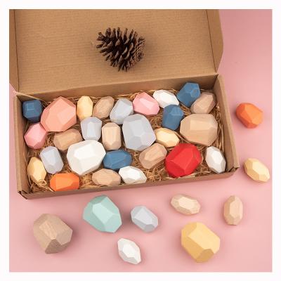 China Eco-friendly Material Creative Nordic Colorful Rock Blocks Stone Building Blocks Natural Wooden Game Balancing Blocks Educational Toys For Children for sale