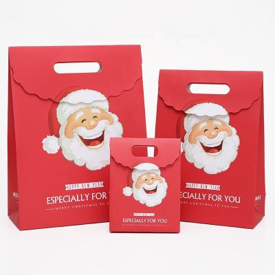 China Recyclable Christmas Cardboard Paper Gift Boxes Christmas Candy Treat Candy Bags Boxes For Christmas Party Favor for sale