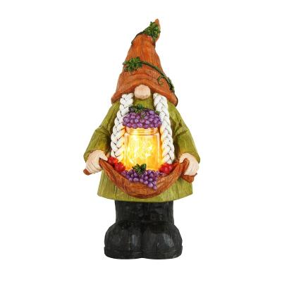 China CLASSIC Autumn Harvest Gnome Garden Ornament Garden Gnome Statue Figurine with Fruit Grape Light in Hand for Bedroom for sale