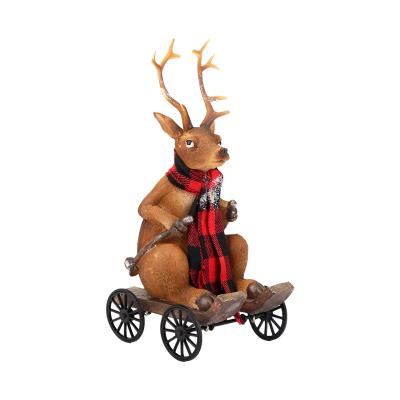 China Cute Eco-friendly Elk Sleigh Christmas Resin Ornaments For Garden Resin Decoration for sale