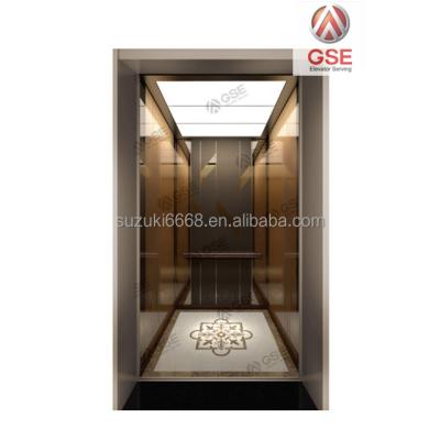 China Guangdong SUZUKI Elevator Manufacturer Cheap Passenger Elevator Standard Hairline Stainless Steel Cabin With Painted Steel Doors for sale