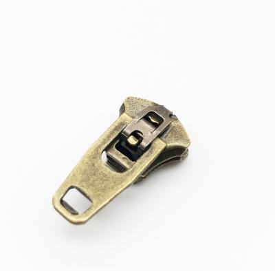 China No.5 YG Zinc Alloy Zipper Slider SEMI Auto Metal Heavy Duty Gold Metal Nickel Free 4YG 4.5YG 5 YG Slider for Jean for sale