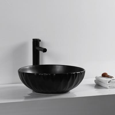 China Bathroom Sink Factory Direct Handmade Gloss Ceramic Simple Clean Easy Countertop Black Matte Wash Basin Bathroom Sink for sale