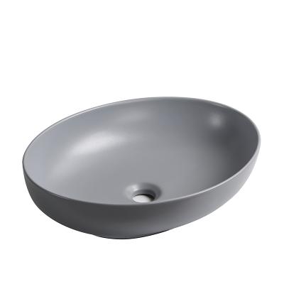 China Good Double-flow Material Sanitary Ware Matt Color Round Basin Ceramic Table Top Bathroom Sink Hand Wash Basin for sale