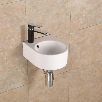 China Factory direct wholesale cheap one piece bathroom ceramic hand wash prices easy clean basins wall hung basin for sale