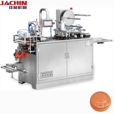 China Hot Selling Automatic Plastic Disposable Coffee Cup Plastic Lid Making Machine for sale