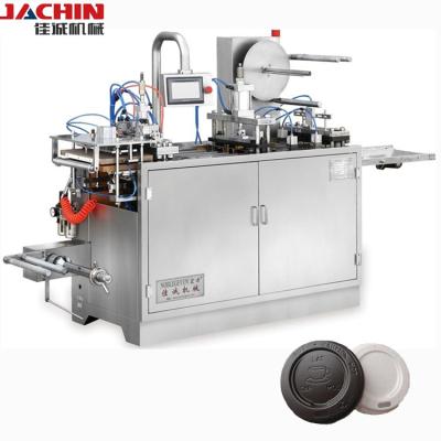 China Full Automatic Plant Tea / Coffee Cup Plastic Cover Forming Machine With Servo Motor Control for sale