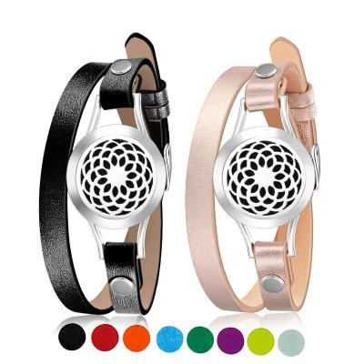 China 25mm Titanium Flower Aromatherapy Steel Hollow Essential Oil Diffuser Leather Bracelet for sale