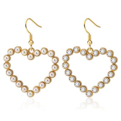 China Temperament CLASSIC Korean peach fashion heart-shaped diamond-studded copper earrings hollow out exaggerated pearl girl ear hook jewelry for sale