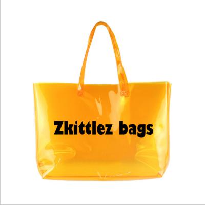 China Small Strong And Comfortable Custom Duffel Bags At MOQ Zkittlez With Letters Printing Transparent Orange Spinnanight Overnight Tote Bag For Ladies Hoe Bag for sale