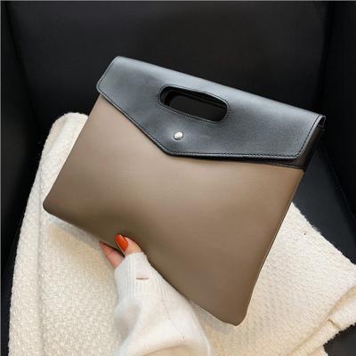 China 2022 new ladies fashion large-capacity handbag business hand-held briefcase retro fashion clutch bag Korean version of the trend for sale