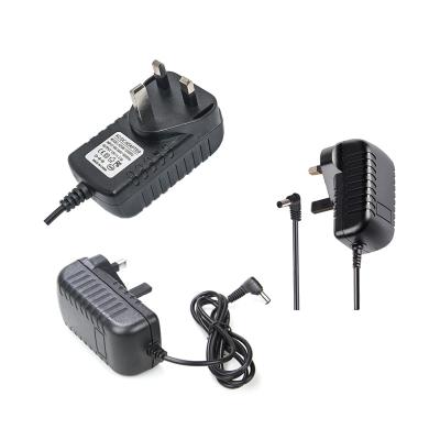 China Universal UK Power Supply Power Adapter 12 Volt 2 Amp Power Adapter 24W VEK-1202000 for sale