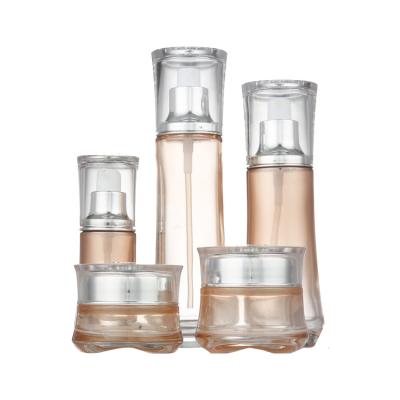 China 2022 New 40ml 100ml 120ml Spray Cosmetic Glass Bottles Full Set Frosted Amber Skin Care Cosmetic Glass Bottle Packaging With Pump for sale