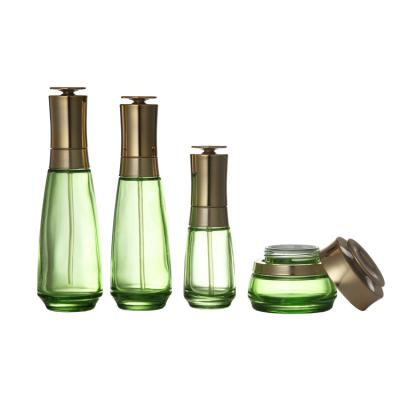 China Cosmetic Container Seal Eco Set Green Glass Jars Bottles For Cosmetics for sale