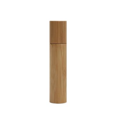 China Hot Sale Stainless Steel Rollerball 5ml 10ml 20ml Cosmetic Wooden Roller Bamboo Packaging Bottle For Essential Oils for sale