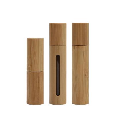 China High Quality Cosmetic Perfume Bottle Glass Lid 10ml 20ml 30ml Essential Oil Packaging Bamboo Roll On Bottle for sale