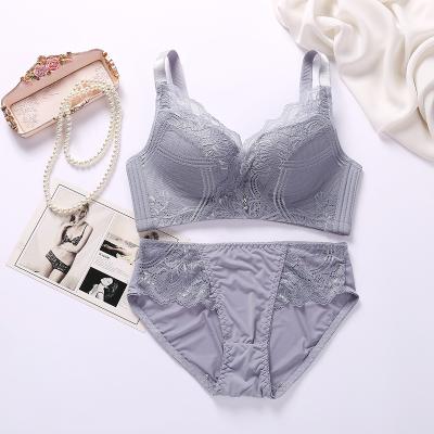 China Pump lace with rhinestones ladies underwear lift up bra panties and bra for sale