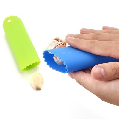 China Viable Kitchen Tool Factory Good Quality BSCI Silicone Flexible Rolling Garlic Peeler For Kitchen Easy To Use for sale