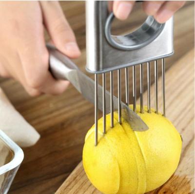 China Sustainable Kitchen Helper Stainless Steel Food Slice Onions Plug Garlic Vegetable Fruit Slicer Tomato Cutter Cutting Helper Safe Holder for sale