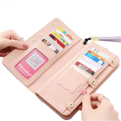 China Custom News Genuine Leather Wallet RFID Card Holder Ladies Mobile Phone Purses Wrislet Long Rfid Wallet Women Leather Purse for sale