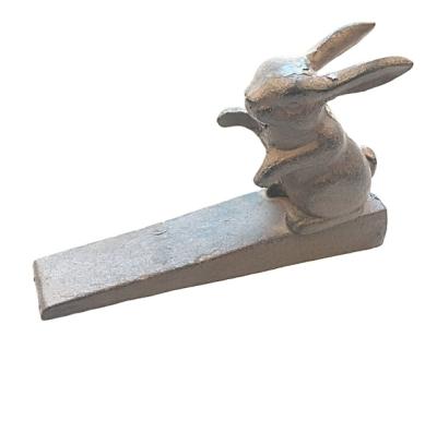 China Modern Home Decoration Cast Iron Rabbit Door Stops Metal Doorstop for sale