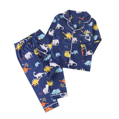 China Factory wadding casual dropshipping soft no wrinkle long sleeve blue dinosaur printed pajamas kids design homefit textile new for sale