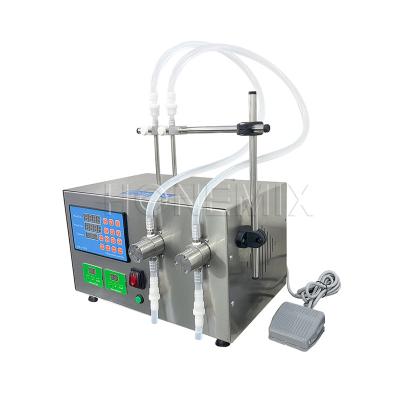 China Desktop Small Bottle Filling Machine Double Head Plastic Ampoule Filling Machine for sale