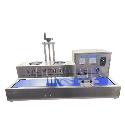 China Horizontal Aluminum Foil Sealing Machine 3KW For Bottles Cap for sale