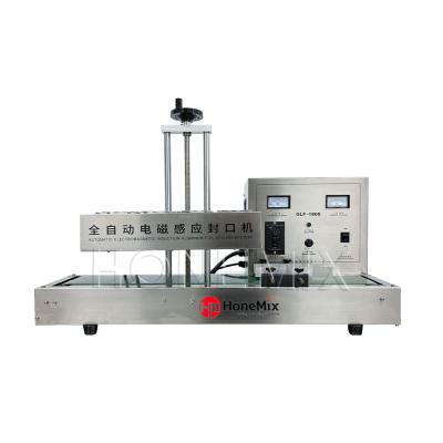 China Horizontal Aluminum Foil Sealing Machine For Bottles Cap for sale