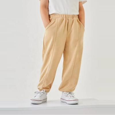 China Fade Proof New Arrival White Color Casual Hip Jogger Hop Front Jogger Boys Kids Sweatpants With Pockets for sale