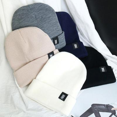 China COMMON Winter Knitted Skullies Beanies Winter Letter Hat Hip Hop Soft Hat For Women Mens Beanies Casual Hood Solid Hat Unisex for sale