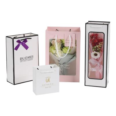 China Uniquecolour Recyclable Custom Printing Gift Commercial Luxury Shopping Paper Bag for sale