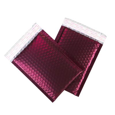 China shockproof custom color film bubble bag clothing carrier bag jewelry courier coextruded bubble bag red pink for sale