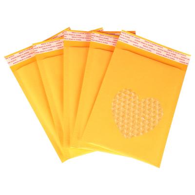 China Lightweight Eco-Friendly Yellow Biodegradable Kraft Bubble Mailer Padded Envelopes Mailing Bags for sale