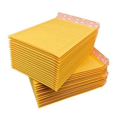 China Water Proof Customs Logo Kraft Paper Letter Envelope Cheap Poly Bubble Kraft Yellow Shipping Bag for sale