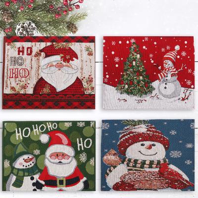 China New Viable Knitted Fabric Santa Snowman Decorative Placemat Cartoon Doll Insulation Place Mat For Christmas for sale