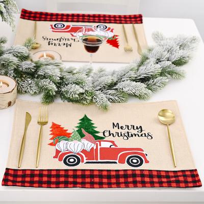 China Creative Christmas Decorations Forest Old Man Car Place Mat Viable Canvas Table Mat For Christmas for sale