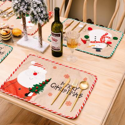 China Christmas viable decoration supplies old man snowman embroidery place mat creative dining table dress insulation mat tablecloth for sale