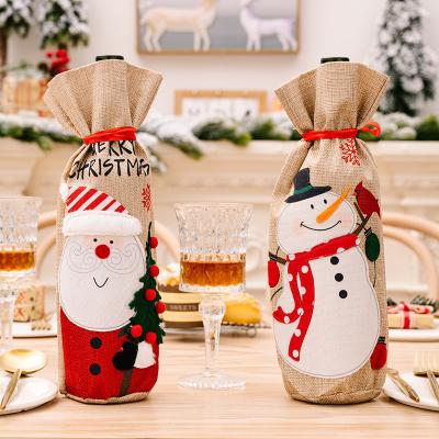 China Christmas Home Decor Old Man Snowman Sticker Cartoon Drawstring Wine Bottle Canvas Bag for sale