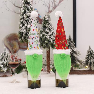 China Creative Novelty Grinch Design Couple Decorative Wine Bottle Cover For Christmas Kitchen Decor for sale