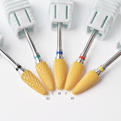 China Ceramic Nail Drill Bits Manicure Machine Gold Accessories Gold Rotary Electric Nail File for sale