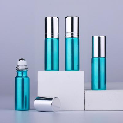 China Personal Care 5ml Mini Blue UV Essential Oil Bottle Roll On Perfume Bottles Glass Ball Roller Essential Oil Bottles for sale