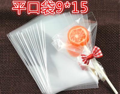 China 2000pcs/lot 9x15cm Food Transparent Flat Lollipop Cookie Gift Cake Packaging Pouch Cellophane Pop Package Baking Bags Small for sale