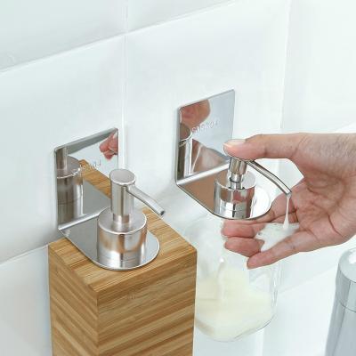 China Soap Dispenser Accessories Stainless Steel Bathroom Shelf Toilet Hanging Shampoo Shower Gel Bottle Holder Bracket for sale