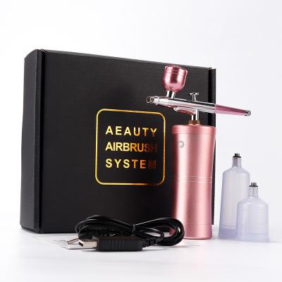 China Hot Selling Mini Air Compressor Kit Air-Brush Paint Spray Gun Airbrush Moisturizer for Art Tattoo Craft Cake Face Nail Fog Nano Mist Sprayer for sale